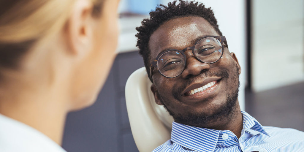 oral surgery patient smiling